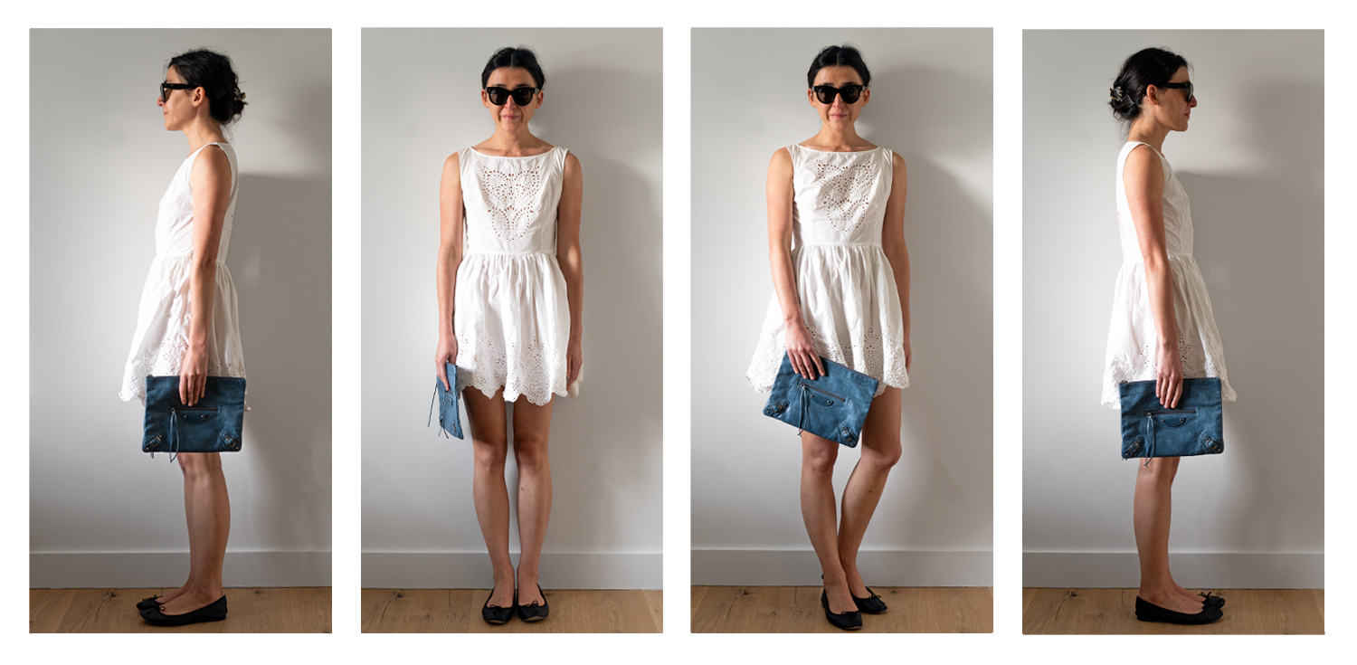 Showing how the Balenciaga Flat Clutch looks like on a 5'5.75" woman