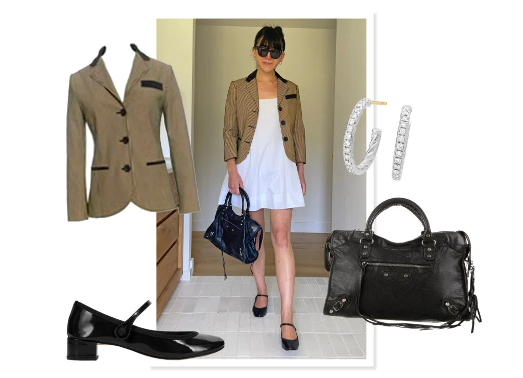 White dress shown with a yellow and black stripe blazer, silver hoops, a black Balenciaga City bag, and black patent Mary-Jane shoes